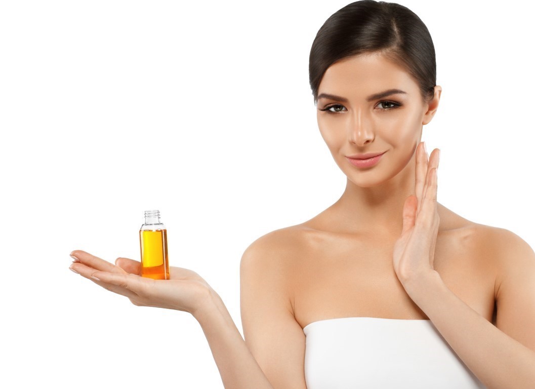 woman with oil cosmetic beauty skin care concept 2021 08 27 23 42 43 utc